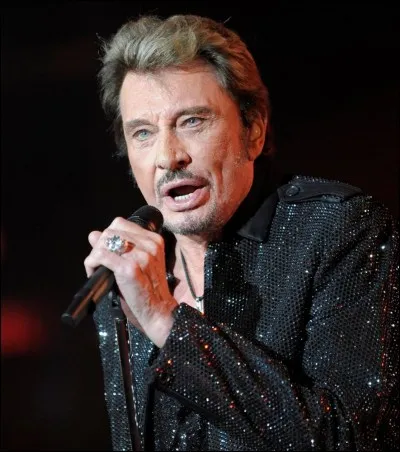 Comment s'appelle l'album de Johnny Hallyday sur lequel figure la chanson "Je n'appartiens qu'à toi" ?