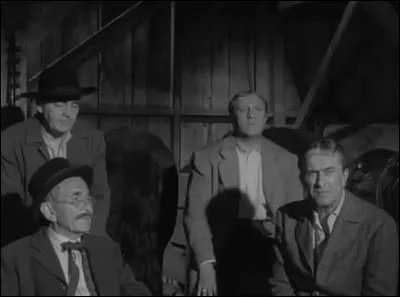 Aux côtés de Robert Mitchum dans le film...