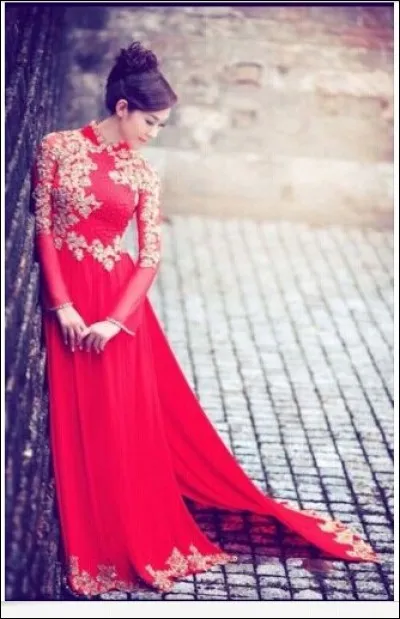 Quelle est la couleur d'une robe de mariée traditionnelle au Vietnam ?