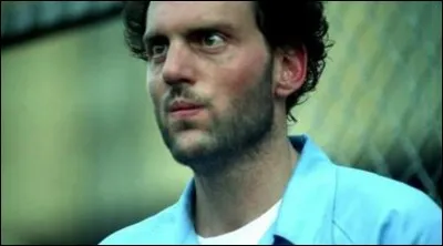 Quelle agression a simulé Michael Scofield lorsque Charles Patoshik a été transféré dans sa cellule ?