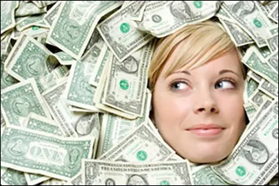 "Être dans le rouge" signifie "Avoir un compte négatif à la banque ou être à découvert.".