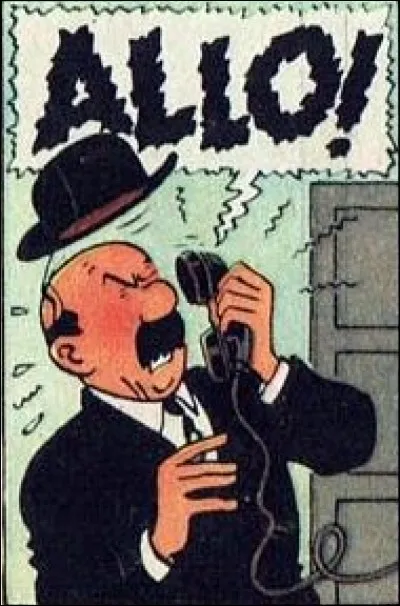 Dans "Coke en Stock", avec quoi le capitaine Haddock répond-il au téléphone ?