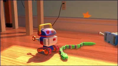 Où peut-on trouver le plus souvent Serpent, le jouet qui appartient à Andy dans ''Toy Story'' ?