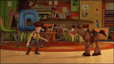Où Pile-Poil se fait-il tatouer le prénom d'Andy dans "Toy Story 2" ?