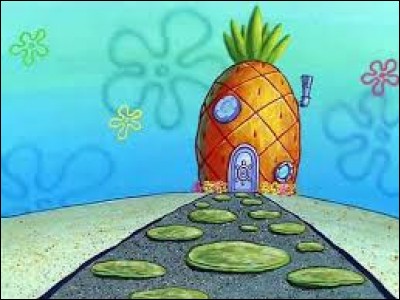 Quel personnage de dessin animé a une maison en forme d'ananas ?