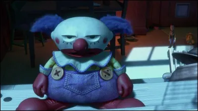 Avec quels autres jouets de "Toy Story III" le clown Rictus a-t-il été oublié par sa propriétaire ?