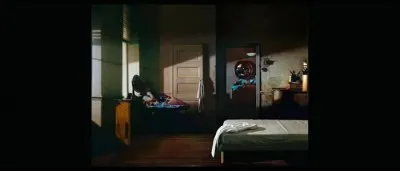 Quel détail de cette photo a permis à Deckard de trouver un indice important pour son enquête ?