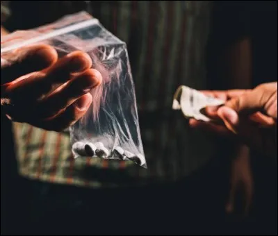 Comment s'appelle le marché noir du district 12 ?