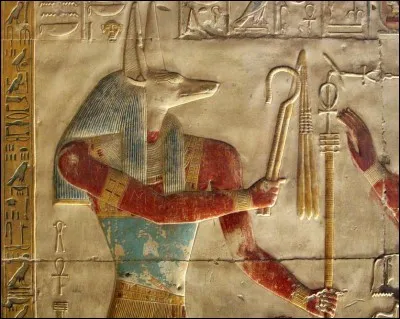 Ce dieu funéraire possède une tête de chacal : il est le protecteur des tombes et des défunts. Il accueille ces derniers à ses côtés et, rôle primordial, il évalue les âmes des morts lors de la pesée du cœur.
Anupet était sa parèdre et elle l'accompagnait à plusieurs tâches.