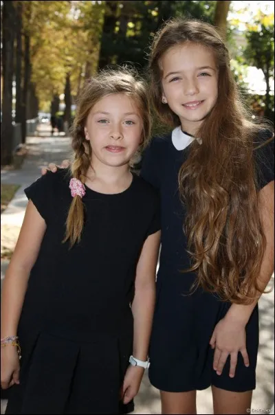 Avec qui Erza est-elle sur cette photo ?