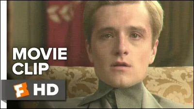 Qu'arrive-t-il à Peeta pendant que Katniss est au district 13 ?