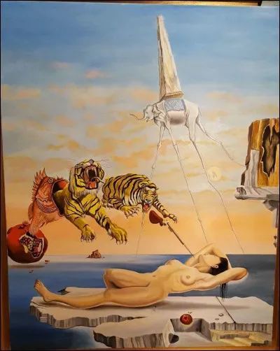 Complétez le titre du tableau de Dali : 
Rêve causé par le vol d'une abeille autour...