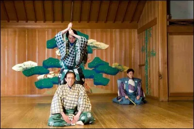 Quel est le nom de la forme comique du théâtre japonais ?
