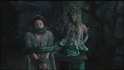 À qui Rumple doit-il donner le gantelet pour sauver Belle ?