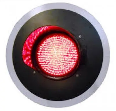 Dans quelles situations puis-je rencontrer un feu rouge clignotant ?