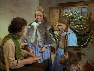 Qu'offre Mary à son père dans l'épisode "Noël à Plum Creek" ?