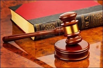 Je travaille dans un tribunal et je m'assure à ce que les témoins, membres du jury ou avocats savent où aller. Que suis-je ?