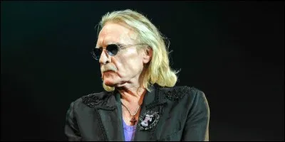 De quelle couleur sont les mots du chanteur Christophe ?