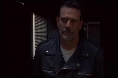 Avec qui Negan est-il enfermé dans un conteneur ?