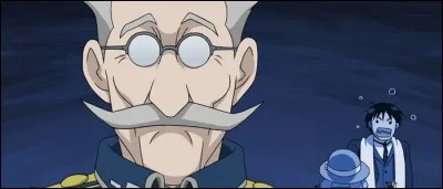 En quoi se déguise le général Grumman quand il vient s'entretenir avec Mustang sur la tombe de Hughes ?