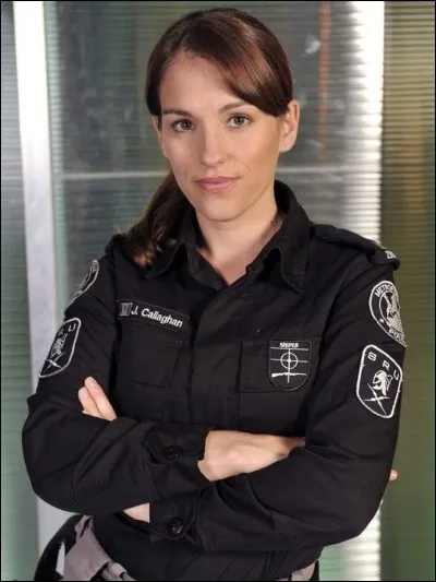 Comment s'appelle cette jeune femme, seule membre féminine de l'équipe ?