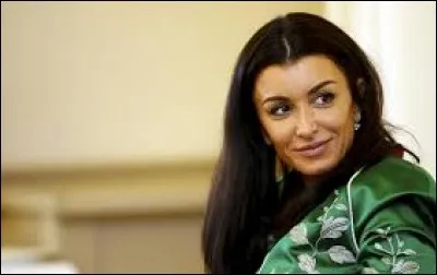 En 2003, quelle chanson chante-t-elle sur scène avec Johnny Hallyday ?