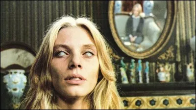 Dans quel film d'horreur italien réalisé par Lucio Fulci une jeune femme hérite-t-elle d'un hôtel à La Nouvelle-Orléans qui fut jadis construit sur l'une des sept portes de l'enfer ?