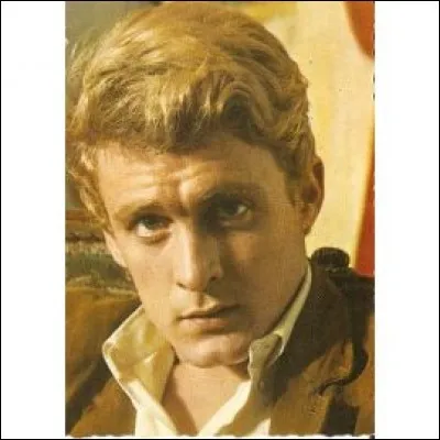 De qui parlait-il en chantant "Je n'ai gardé que ce doux visage, comme une épave, sur le sable mouillé..." ?