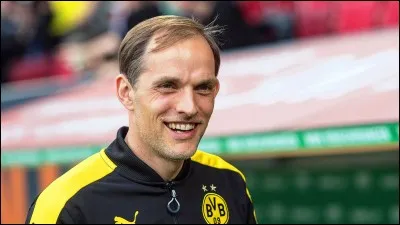 Qu'est-ce qui manque au mot "entr .........." qui est une personne chargée de la préparation d'une équipe ?