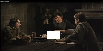 Qu'est-ce que le maître d'armes est en train de faire dans la gamelle de Léodagan ?