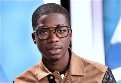 Dans quel arrondissement de Paris a-t-il grandi ?