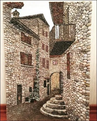 Dans quel département est le pittoresque village médiéval de Pérouges ?