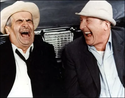 Aux cts de quel athlte Louis se retrouve-t-il sous la douche, coeur par la comparaison des physiques, dans ' Le corniaud' ?