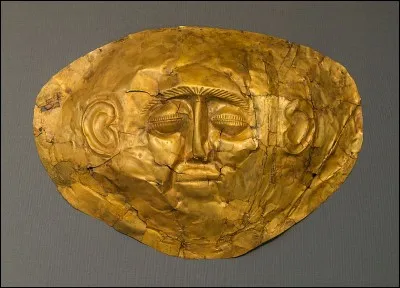 Provient d'une cité qui domina le monde de la Méditerranée orientale du XVe au XIIe siècle av.J.-C. L'Unesco dit que cette cité est ''liée aux épopées homériques de l'Iliade et de l'Odyssée dont la profonde influence sur la littérature et les arts persiste depuis plus de trois millénaires.'' Trouvez l'objet et le site archéologique de ce masque qu'on retrouve au musée d'Athènes.