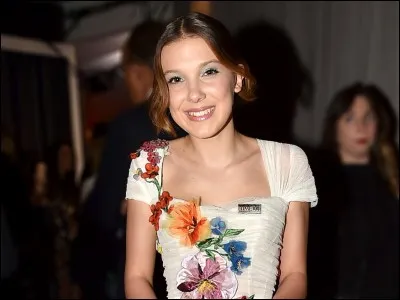 Sur cette image, à quelle cérémonie Millie a-t-elle participé ?