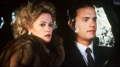 Année : 1990
Genre : Comédie 
Acteurs : Tom Hanks, Melanie Griffith
Indices : Finance/Politiciens/Accident/Innocent. 
Quel est ce film ?