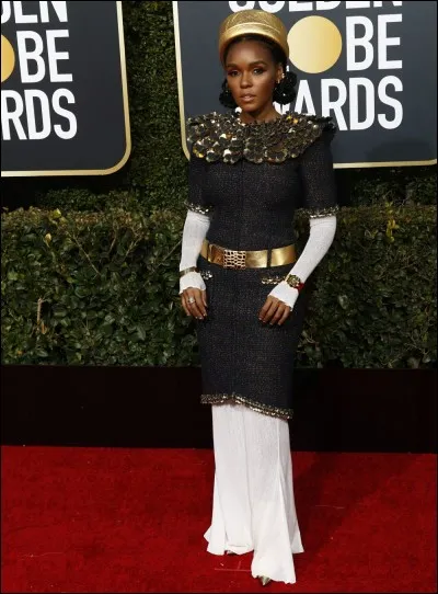 C'est Janelle Monae, qui est ainsi habillée (sic), en plus par un grand nom de la haute couture française... Qui donc, à votre avis ?
