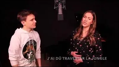 Comment s'appelle la femme avec qui il a interprété la chanson "Wolves" ?