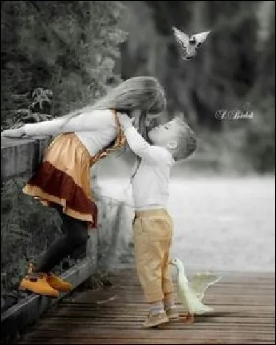 Dans sa chanson Rockcollection, Voulzy évoque un souvenir d'adolescence, en gardant dans le cur, une petite fille à la sortie du lycée. Comment la décrit-il, dans ses souvenirs ?