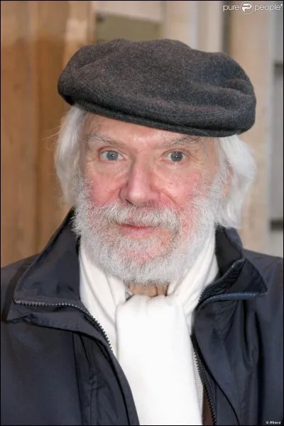 Qui est la dame brune à qui Georges Moustaki écrit un poème ?