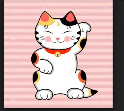Chat blanc assis avec des taches noires et rousses levant la patte au niveau de l’oreille ! Comment appelle t-on cette statue traditionnelle très populaire considérée comme un puissant porte bonheur au Japon et célébrée chaque année le 29 septembre ?