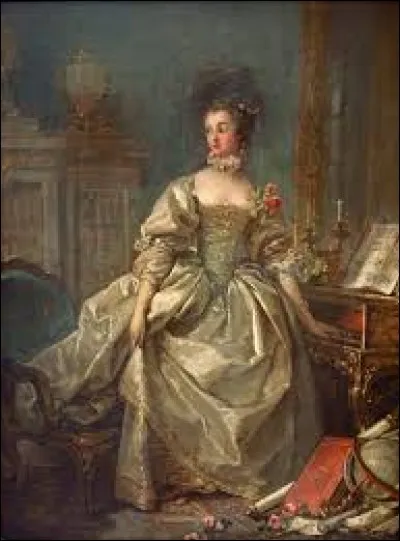 Voici Madame de Pompadour, la main sur le clavier, qui pose pour :