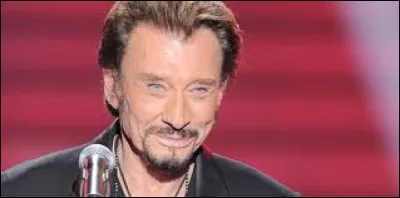 Quel est le titre de la chanson de Johnny Hallyday où il titille Antoine ?