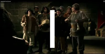 Sur cette image, qu'est-ce que l'homme à la gauche de Guethenoc tient en main ?