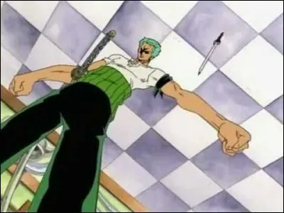 Quel sabre était sur le point de trancher le bras gauche de Zoro à Loguetown ?