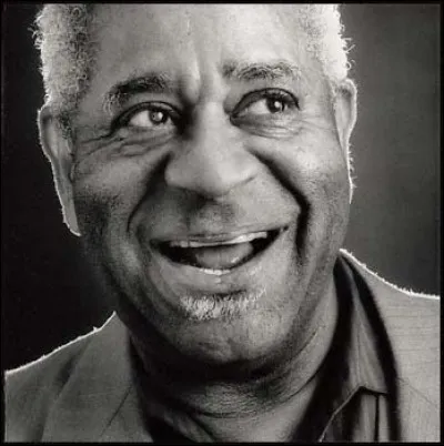 De quel grand trompettiste John Birks &eacute;tait-il pr&eacute;nom complet ?