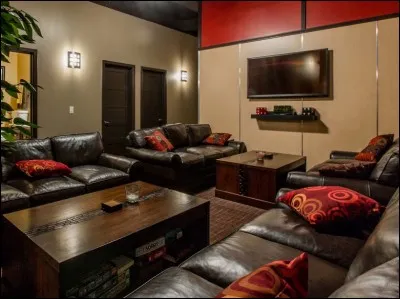 Dans ce lieu, nous pouvons regarder les informations à la télévision, affalés sur les canapés. C'est...