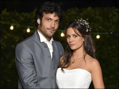 Comment s'appelle l'homme qui l'accompagne sur la photo ?