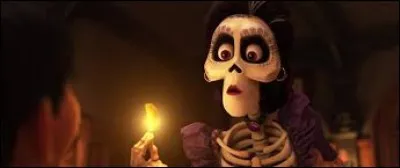 Quelle fleur Imelda donne-t-elle au petit garçon comme bénédiction ?