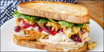 Complétez la phrase : "I'am hungry, shall we  a sandwich ?".